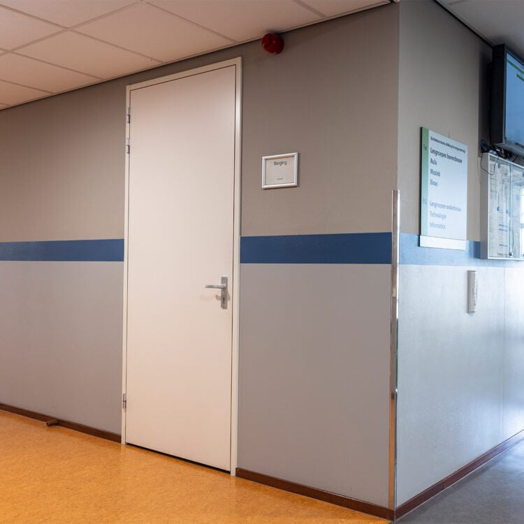 Berkenschutse Heeze onderwijsinstelling wandbescherming installatie